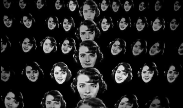 Screenshot of Ruby Keeler's floating heads in Dames, director Ray Enright (1934), and choreographer Busby Berkeley, from the "I Only Have Eyes For You" musical number, starring Ruby Keeler.