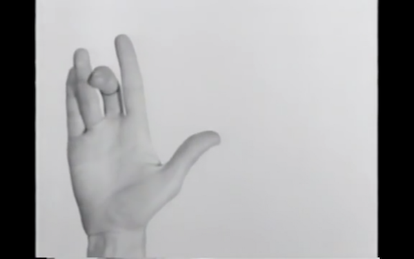 Screenshot. Hand Movie. Chor. and Perf. Yvonne Rainer. Cinematogr. William Davis. 1966.16mm.